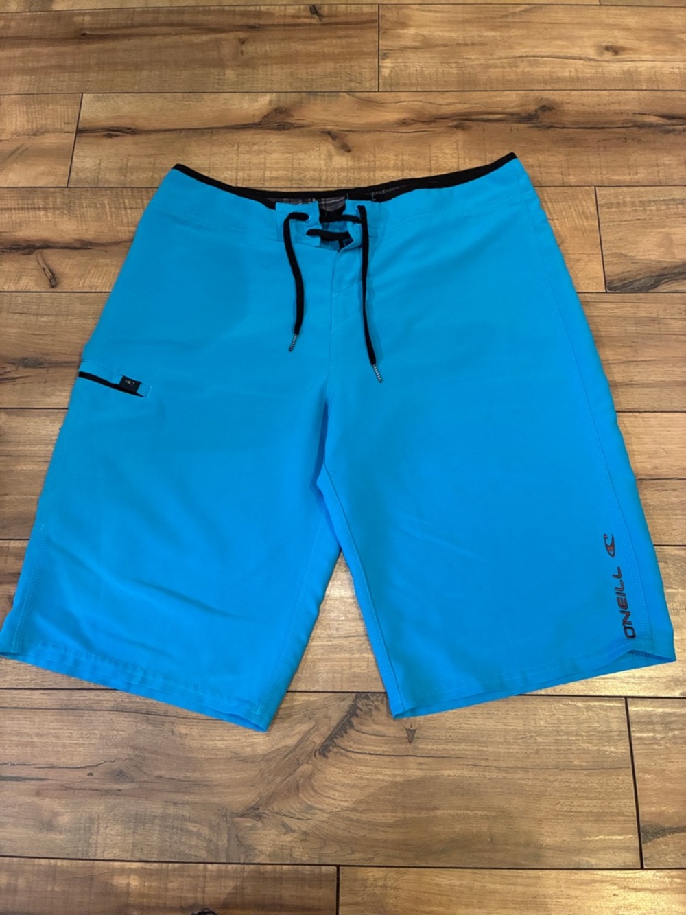 O'Neill Men’s Bright Turquoise Board Shorts with Black Trim